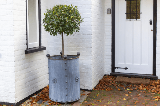 An Arthur Jack round steel planter