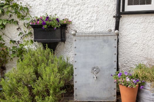 An Arthur Jack water butt with rainwater diverter
